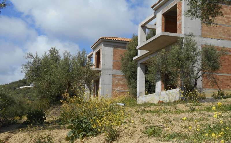 Plots with four buildings and a building with a swimming pool for sale in Gialova